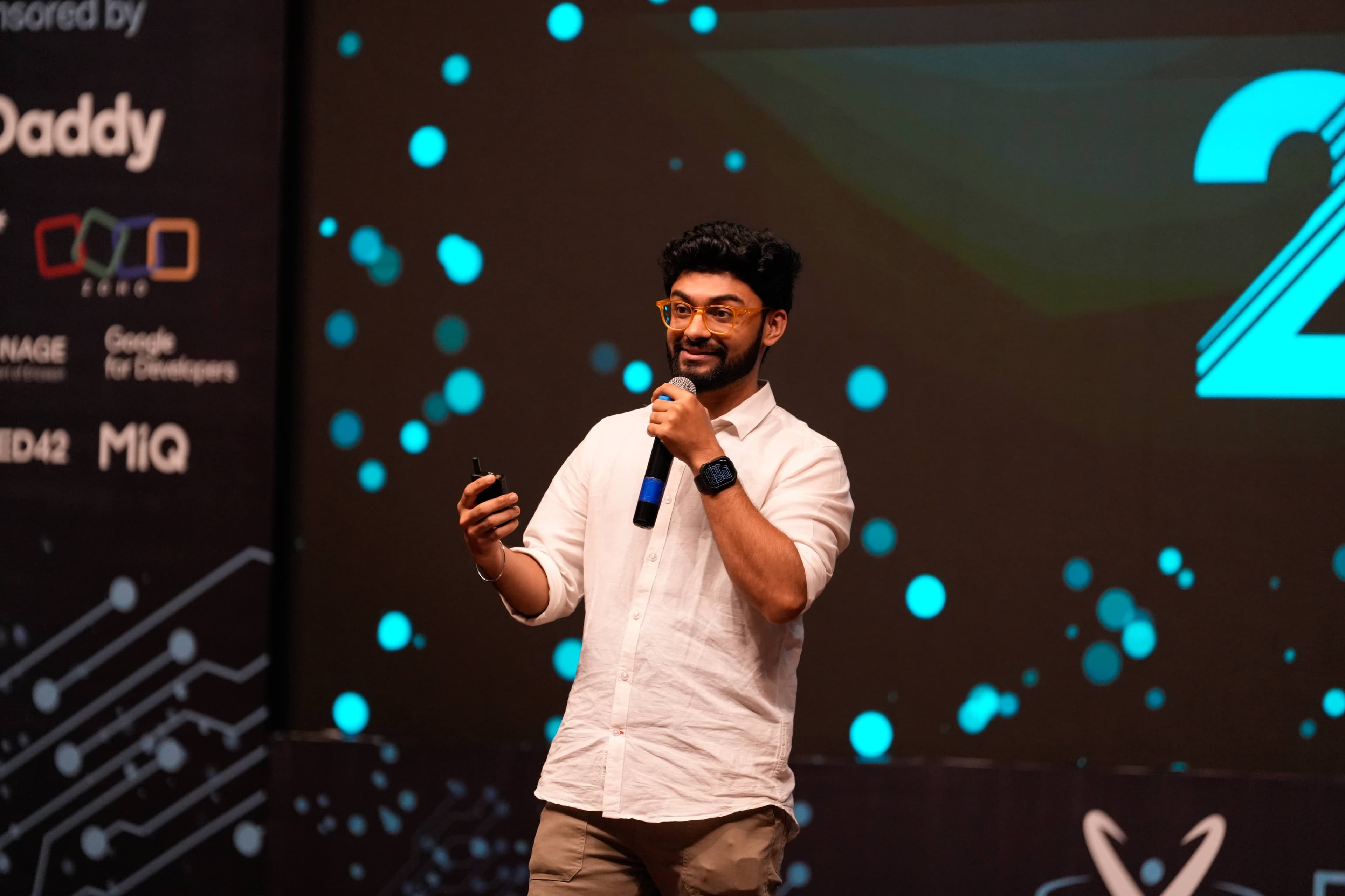 My badge on top of a pile of badges from a Vercel meetup we held