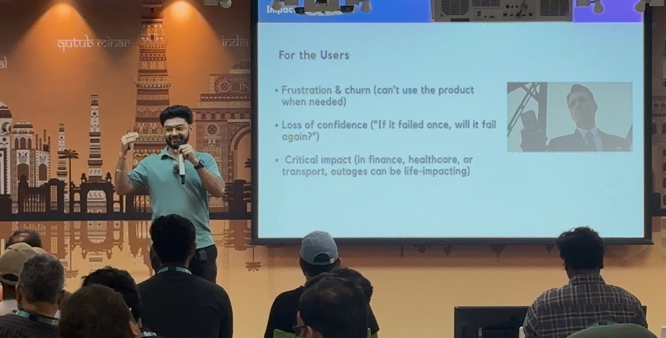 Me standing on stage at SmashingConf giving a talk about my optimism for the web